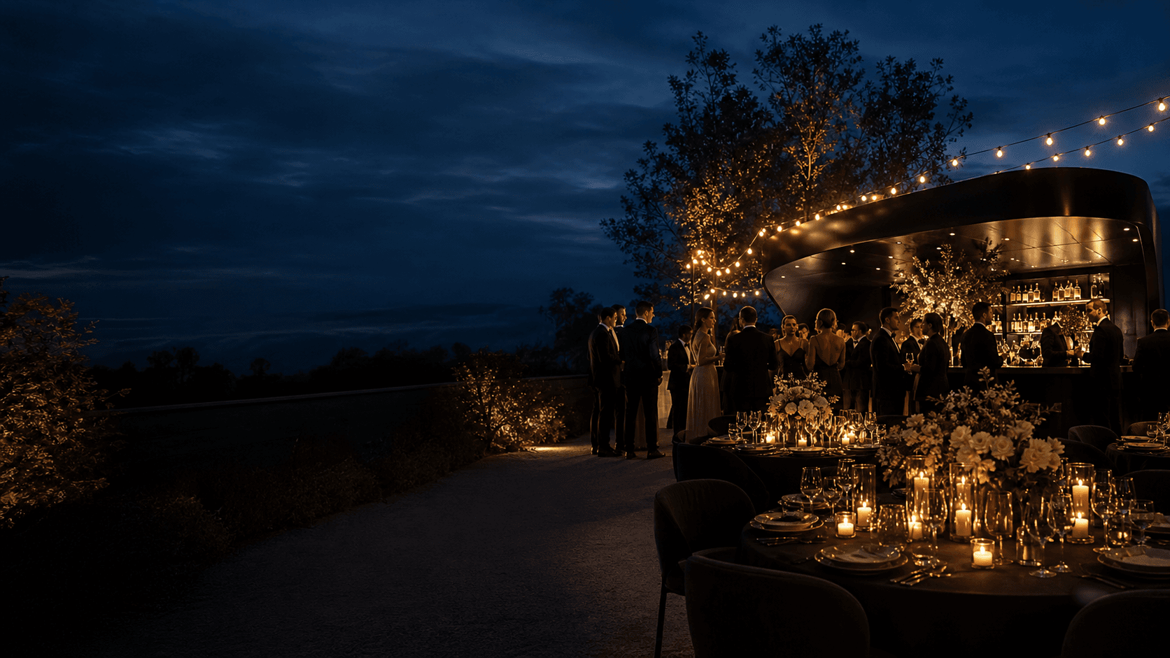 Candlelit outdoor gala with a sculptural black bar