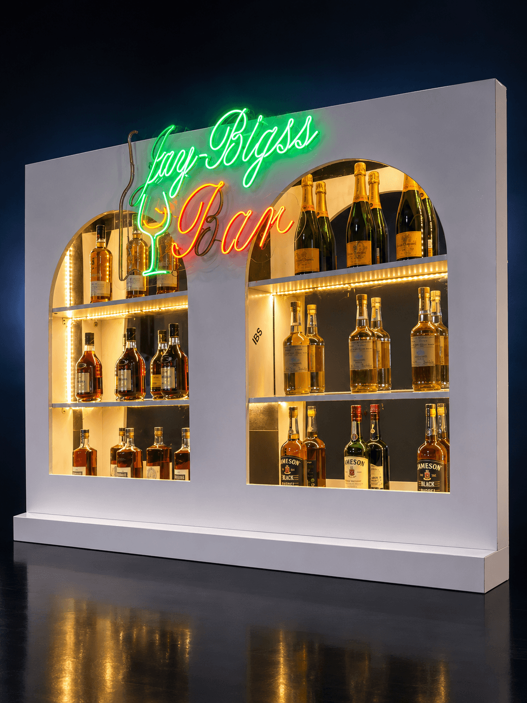 The illuminated Jay-Bigss Bar shelf being staged with bottles ahead of service